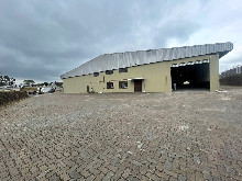 Warehouse exterior with yard shown